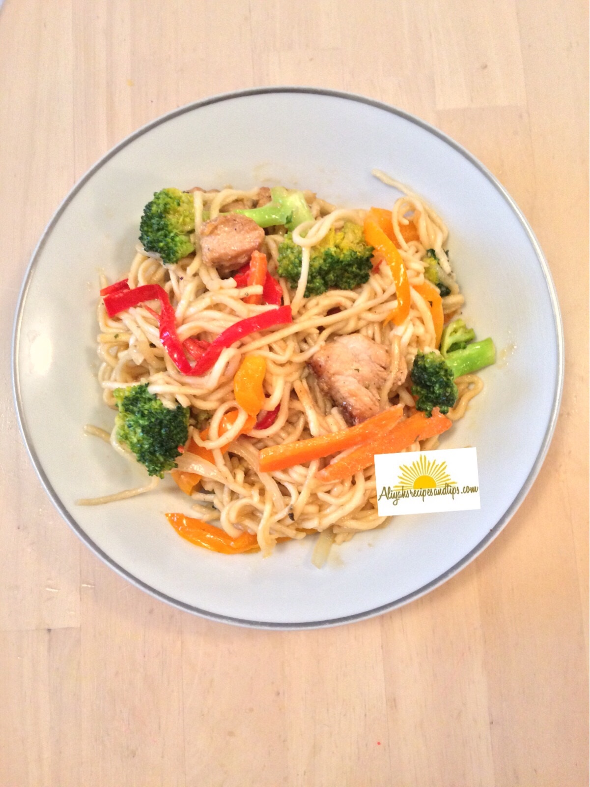 chicken stir fry with noodle served
