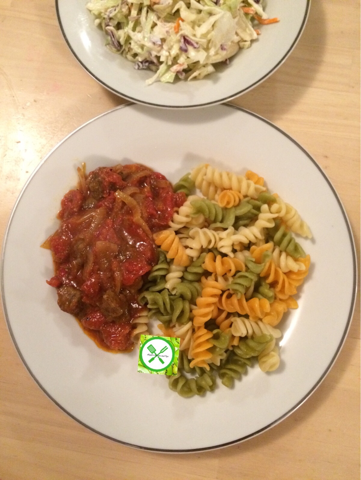 pasta with tomato beef sauce served