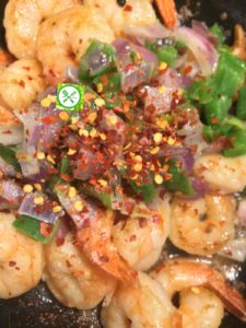 Sweet and spicy mango shrimp add red pepper