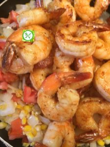 Shrimps, roasted corn, avocados salad