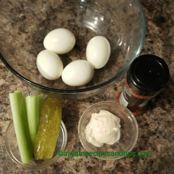 Chop the hardboiled eggs, chop the pickle, celery and add all the ingredients together. Spread over toast bread, you can add some avocados slices if you desired or just eat the egg salad by itself. Enjoy!